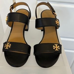 Tory Burch 2 1/2 inch sandals slightly worn like new. Wore one time